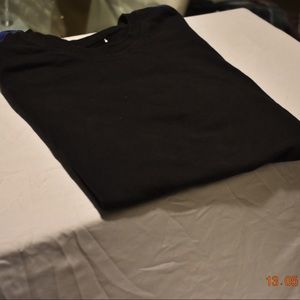 T shirt with different colored stripes on sleeve